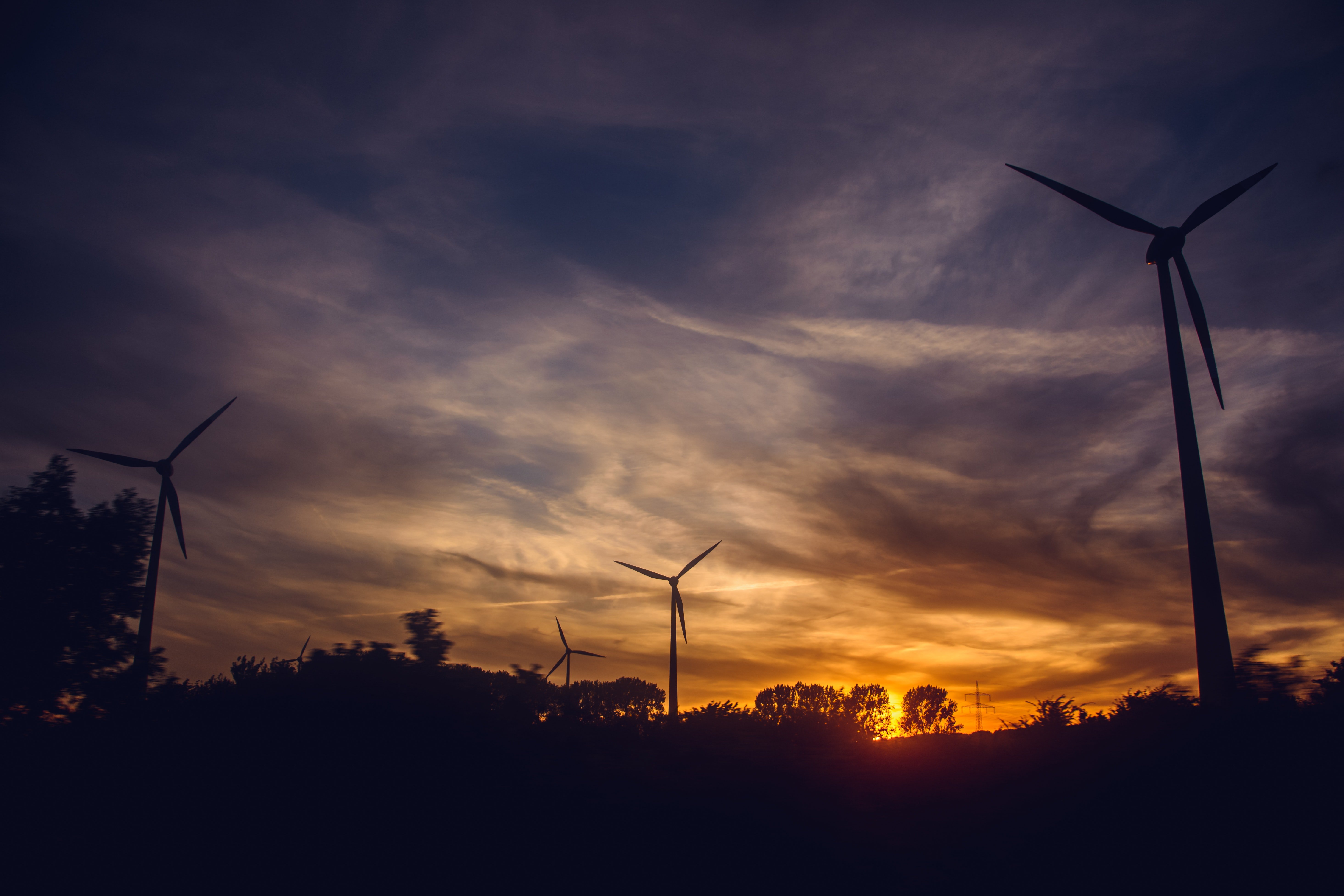 black-windmills-during-sunset-671585